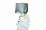 Medical female doctor holding skulls roentgen in front of her head
