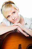 blond woman with guitar on isolated white