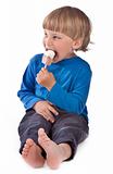 small boy eating ice lolly