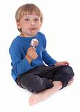 small kid eating ice lolly 