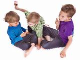 three kids eating ice lolly