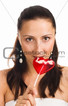 Portrait of woman sucking her candy