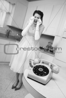 Woman Weeps By The Telephone