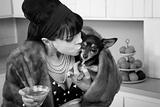 Woman Kisses a Dog