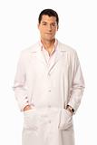 Doctor smile hands on pockets isolated on white background