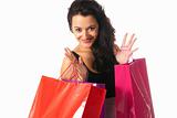 Young woman with shopping bags close-up isolated on white background
