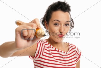 Young woman with big pencil drawing to camera isolated on white background