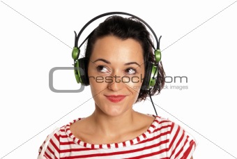 Young woman listening music with headphones isolated on white background