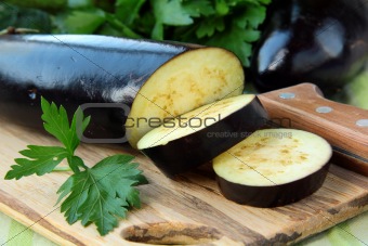 fresh ripe organic eggplants on a wooden table
