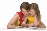 Mother and daughter read book