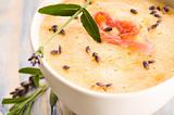fresh melon soup with parma ham and lavender flower