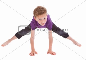 little boy is trying to make spine