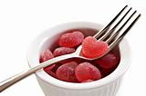 Red heart shaped jelly sweets with fork