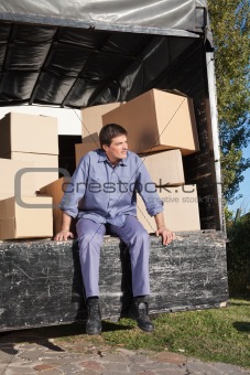 Thoughtful man sitting in the truck