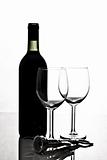 bottle of wine and wineglasses on white background