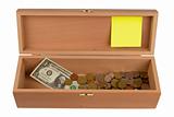 Open wooden box with money