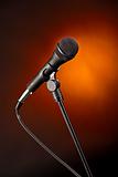 Microphone on Spotlight Gold Background