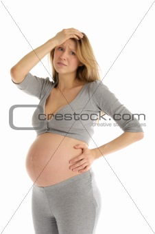 offended pregnant woman in gray suit