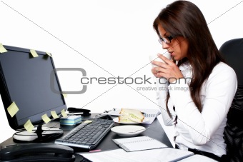 Young business woman drinking coffee 