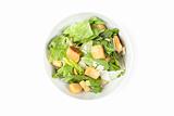 A green salad with croutons and cheese