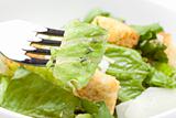 A green salad with croutons and cheese