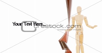 Wood Doll and Strip of Film On White With Space for Text