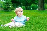 child on the grass