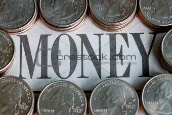 U.S. quarters surrounding the word “Money”