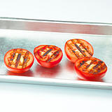 tray of grilled tomatoes