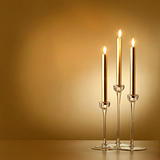 three gold candles