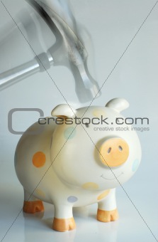 Hammering the piggy bank in action
