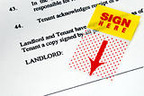 The sign-here sticker on the rental contract