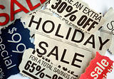 Various holiday on sale signs from the newspapers