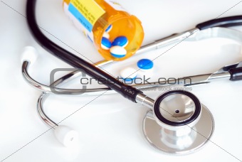 A stethoscope and some medicine