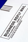 Close-up view of a Business Reply Mail isolated on blue