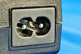 Close up view of a electric jack isolated on blue