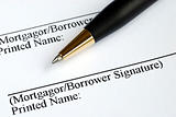Sign your name here on the mortgage application