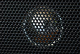Close up view of the speaker from a radio
