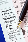 Sign the income tax return isolated on blue