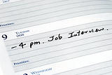 Mark the job interview in the day planner
