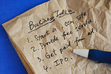 creative business ideas on a tissue isolated on blue