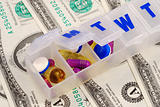 Drug holders on some dollar bills concepts of rising medical cost