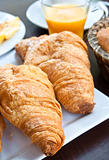 fresh croissant with orange juice