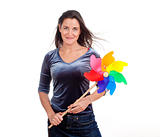 beautiful young woman holding a multicolored pinwheel - isolated on white 