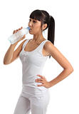 Fit healthy girl drinking water