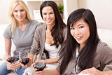 Interracial Group Three Women Friends Drinking Wine Together at 