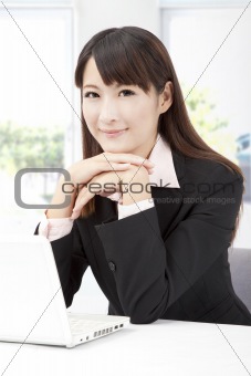 young businesswoman with computer in the office