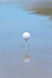 Golf ball on beach