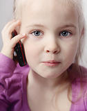 Little girls with telephone