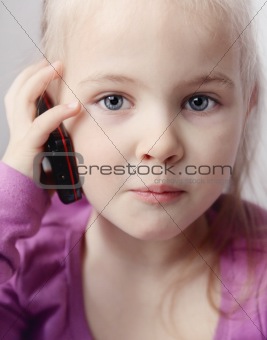 Little girls with telephone